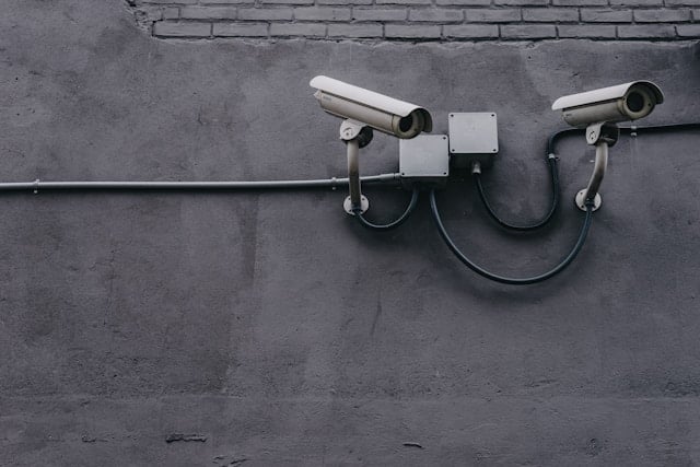 https://unsplash.com/photos/two-bullet-surveillance-cameras-attached-on-wall-yekGLpc3vro?utm_content=creditShareLink&utm_medium=referral&utm_source=unsplash