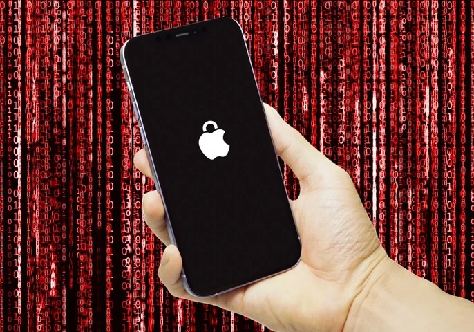 Person holding an iPhone up against a red background with binary code.