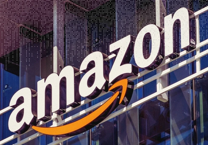 Large Amazon logo on the side of a building.