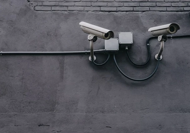 https://unsplash.com/photos/two-bullet-surveillance-cameras-attached-on-wall-yekGLpc3vro?utm_content=creditShareLink&utm_medium=referral&utm_source=unsplash