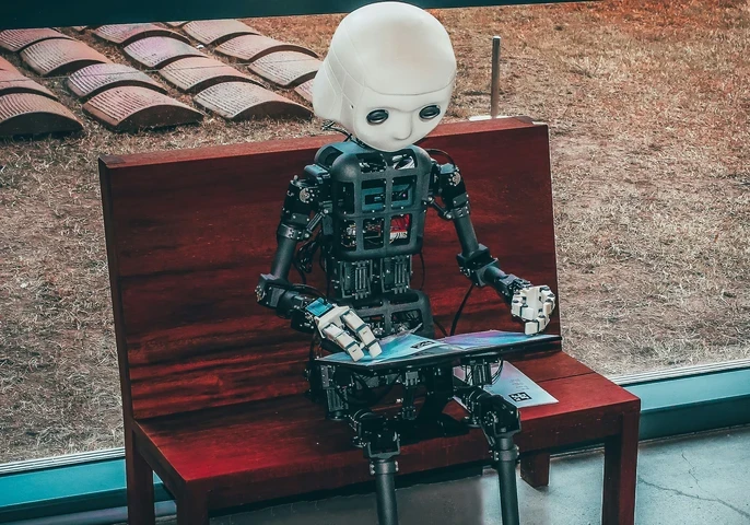 https://unsplash.com/photos/black-and-white-robot-toy-on-red-wooden-table-zwd435-ewb4?utm_content=creditShareLink&utm_medium=referral&utm_source=unsplash