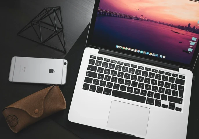 https://unsplash.com/photos/macbook-pro-beside-space-iphone-6-on-black-wooden-surface-dsOvZnqGawg?utm_content=creditShareLink&utm_medium=referral&utm_source=unsplash