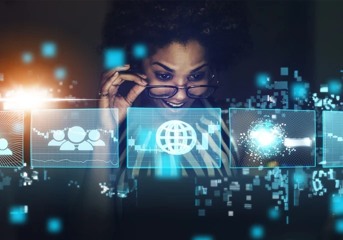 Header graphic for an EM360Tech article titled “What Is the Digital Divide Today?” with the subtitle “We explain what the digital divide means today and why digital participation now matters as much as internet access.” The image shows a woman looking through glowing blue digital interface panels with icons for users, global connectivity and data, with the EM360 Enterprise Management 360 logo at the top.
