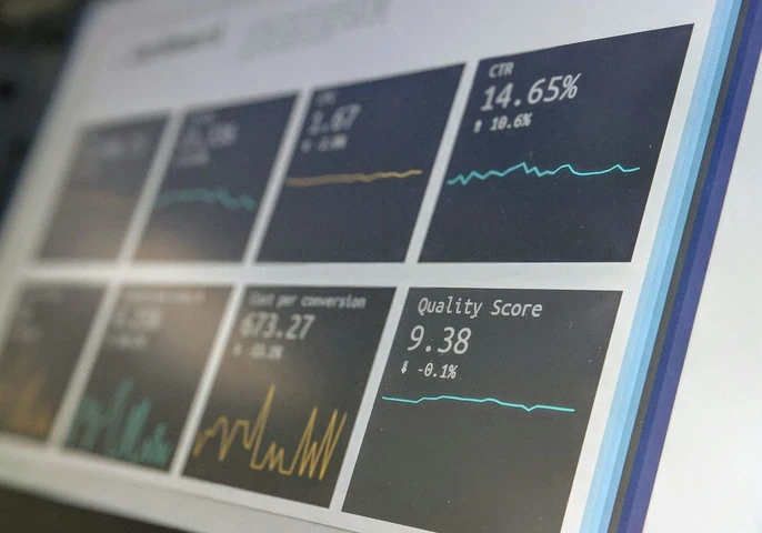 Data reporting dashboard on a laptop screen.