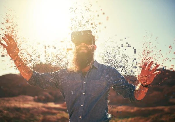 A person wearing a VR headset as if they are becoming part of the virtual world