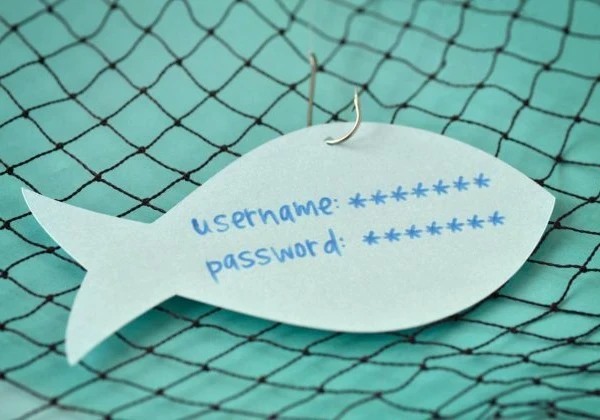 Cybersecurity concept showing a phishing email targeting an employee.