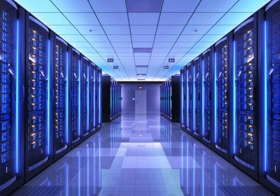 Image showing a large warehouse with servers behind glass doors