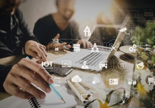 Workers working on laptops in an office