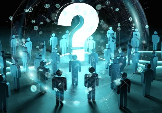 figures of people looking at a large question mark showing confusion