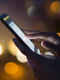 Person using a smartphone while outside