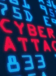 The words "Cyber Attack" in red letters on a coding background.