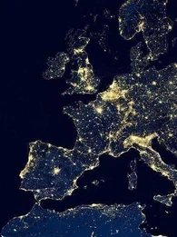 Satellite view of city lights across European continent.