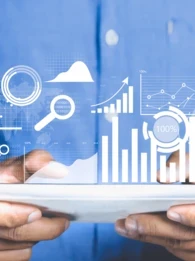 An animated depiction of graphs coming out of a tablet held by a businessman
