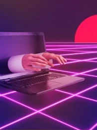 Hands reaching out of a laptop screen against an 80s-style neon background.