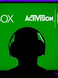 Silhouette of a person with headphones on in front of a green TV screen displaying logos from XBox, Activision and Blizzard.