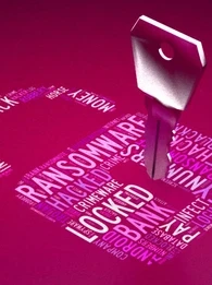 Image showcase a silver key opening an animated lock to represent ransomware.