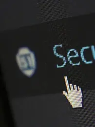 cybersecurity on a screen with mouse icon hovering over 