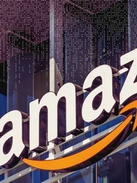 Large Amazon logo on the side of a building.