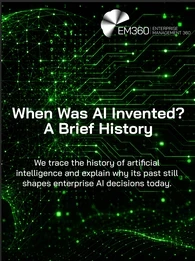 Header graphic showing a glowing green wireframe human face in profile on the left, made from interconnected dots and lines. Green circuit-board patterns and digital connections extend across a black background. Large white text reads 'When Was AI Invented? A Brief History', with a subtitle explaining that the article traces the history of artificial intelligence and its influence on enterprise AI decisions today. The EM360 Enterprise Management 360 logo appears in the top right corner.