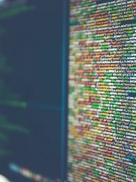 Close-up of a computer screen showcasing colourful lines of code.