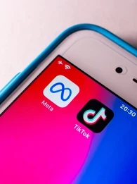 meta tiktok logos on phone banning ads