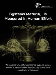 EM360 article header titled &ldquo;Systems Maturity Is Measured In Human Effort.&rdquo; Against a black background, a stylised balance scale is held between two digital hands. One side contains an AI chip symbol and the other a human brain, representing the relationship between automation and human effort. Text reads: &ldquo;We examine why mature enterprise systems reduce human effort instead of redistributing operational complexity onto people.&rdquo; EM360 Enterprise Management 360 branding appears at the top right.