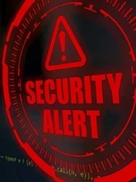 Bright red security alert on a screen with green code.