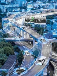 Interconnected smart cars connecting wirelessly on a highway.