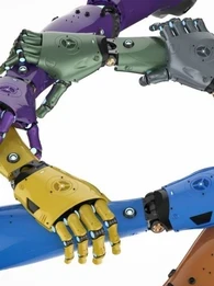 Colourful robotic arms interlinking together in a star shape.