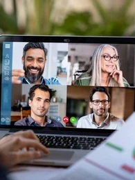 Someone on a video conference with four other people