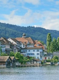 Lake Zug in Switzerland with the lakeside town and hills in the background