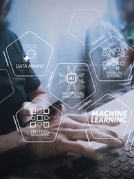 a person working on a laptop with 'machine learning' and 'algorithm' overlaid