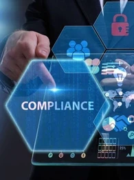 An image with the word "Compliance" and honeycomb shapes with icons in them floating around a person holding a tablet.