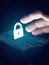 image of a smartphone with code on the screen and a graphic of a padlock floating above
