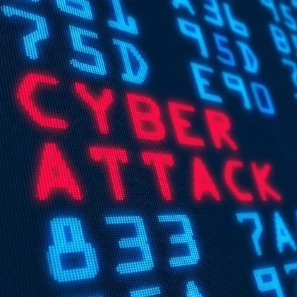 The words "Cyber Attack" in red letters on a coding background.