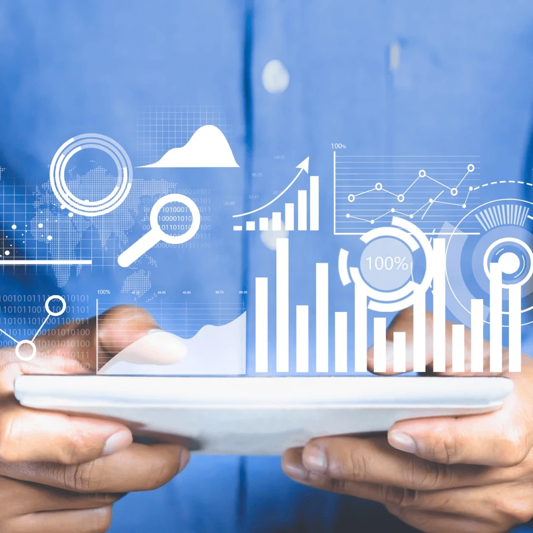 An animated depiction of graphs coming out of a tablet held by a businessman