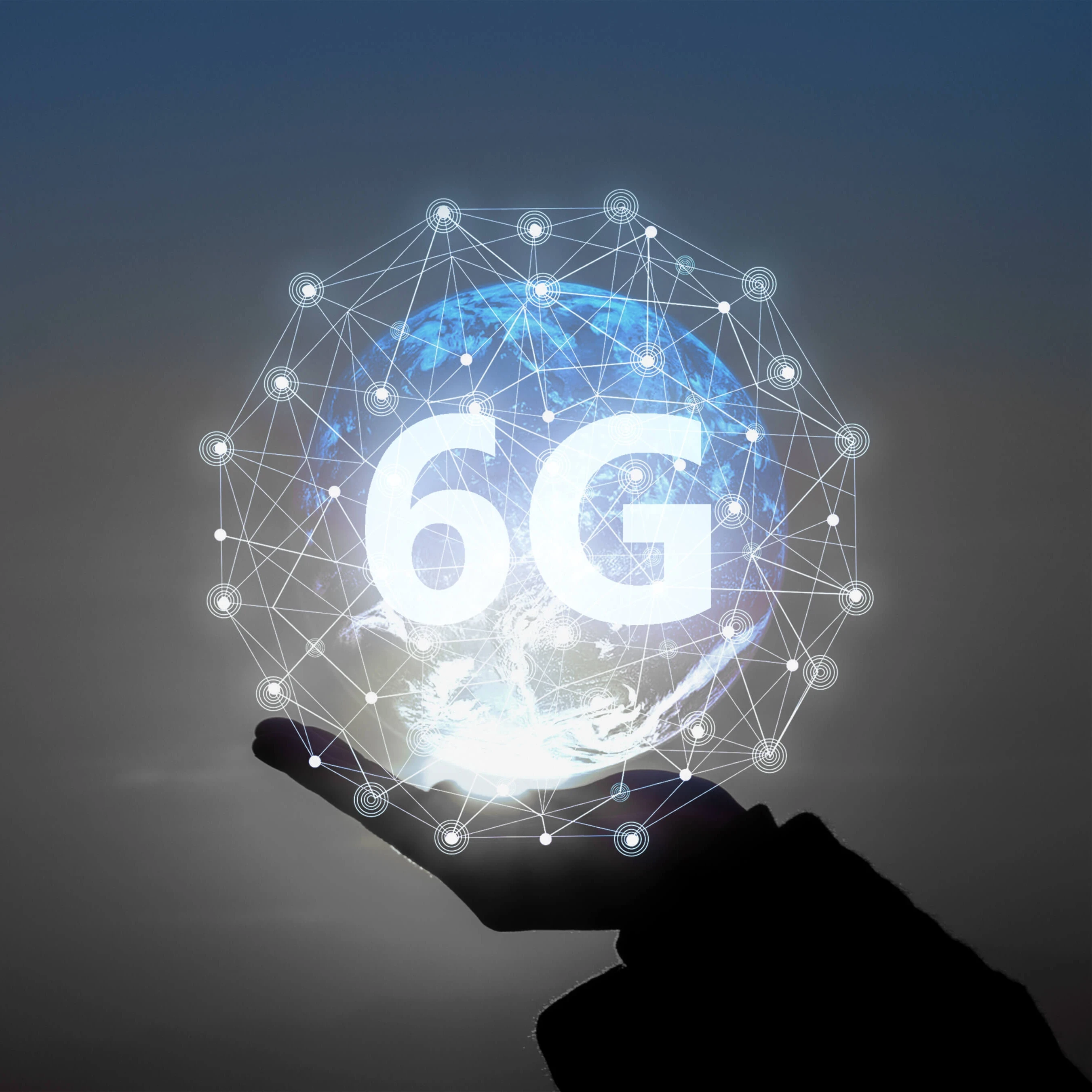 A hand holding up an animated ball signifying connectivity around the world with the word "6G" on it.