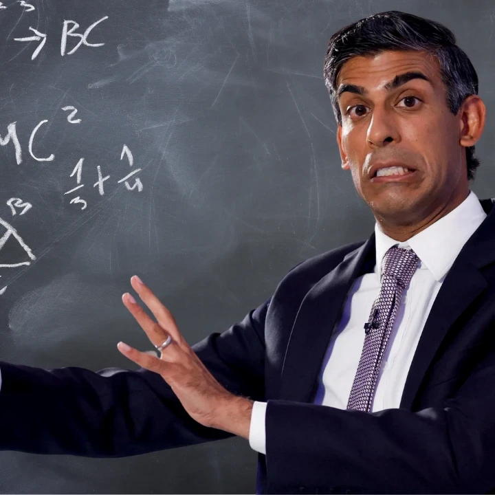 Rishi Sunak in front of a chalkboard with math formulas.