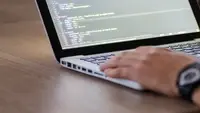 photo of person coding