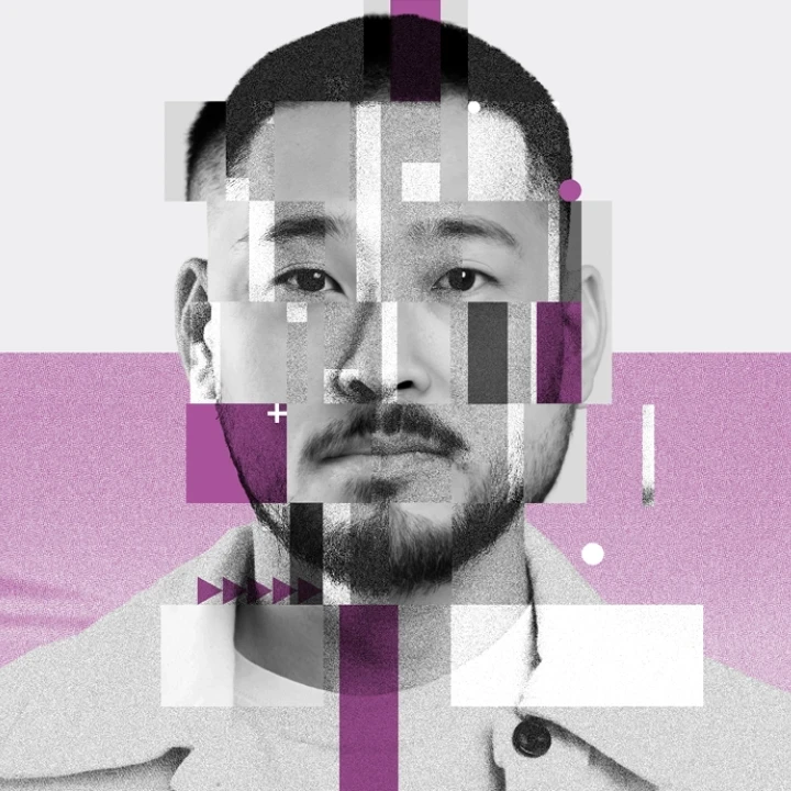 A head-on picture of a man with fractured blocks around his face.