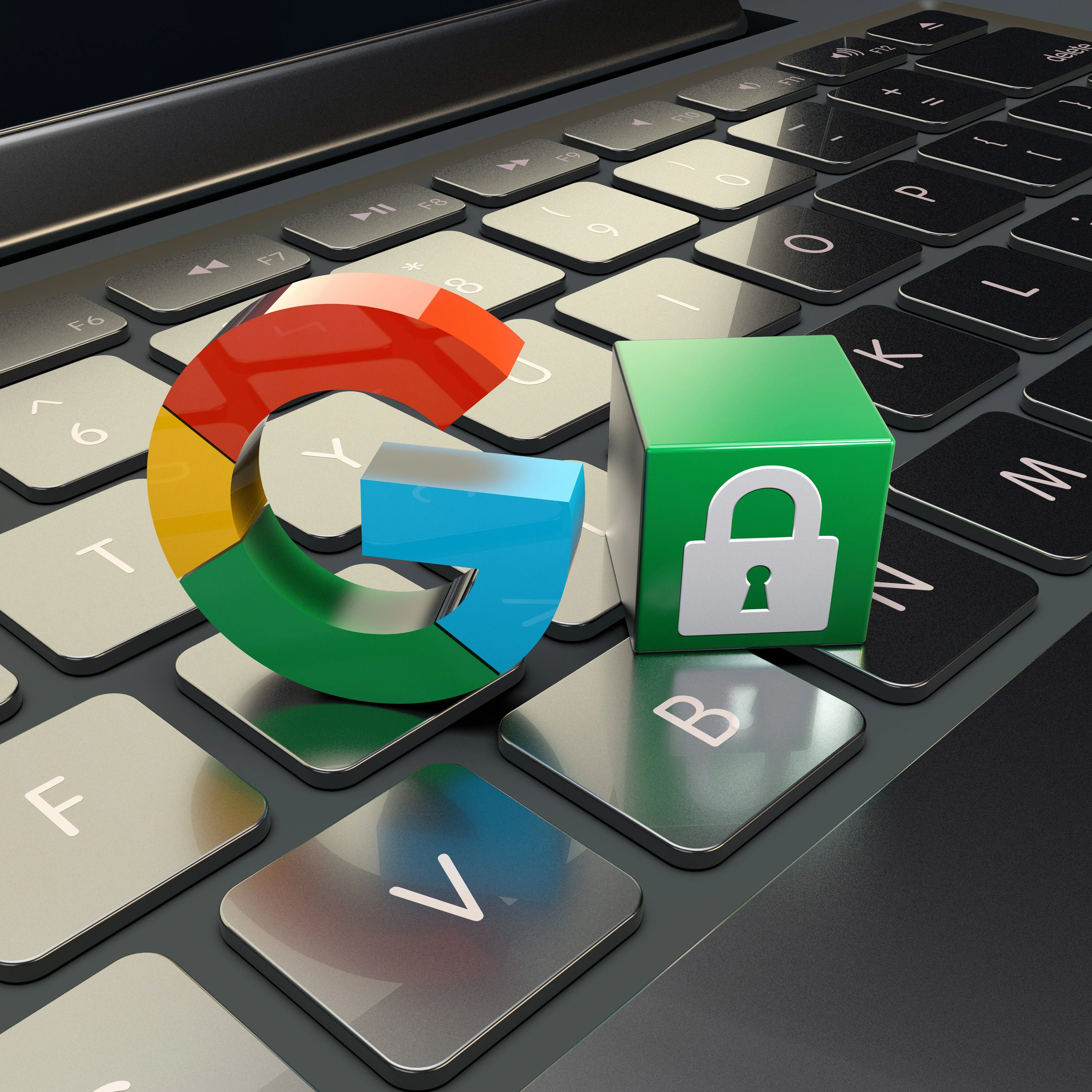 Google logo on a keyboard with a lock block next to it
