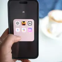 https://unsplash.com/photos/a-person-holding-a-cell-phone-in-their-hand-hWSNT_Pp4x4?utm_content=creditShareLink&utm_medium=referral&utm_source=unsplash