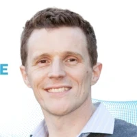 The conversation explores AI integration, the complexities of managing large-scale data distribution, and the cultural and technological shifts necessary to support these advancements.