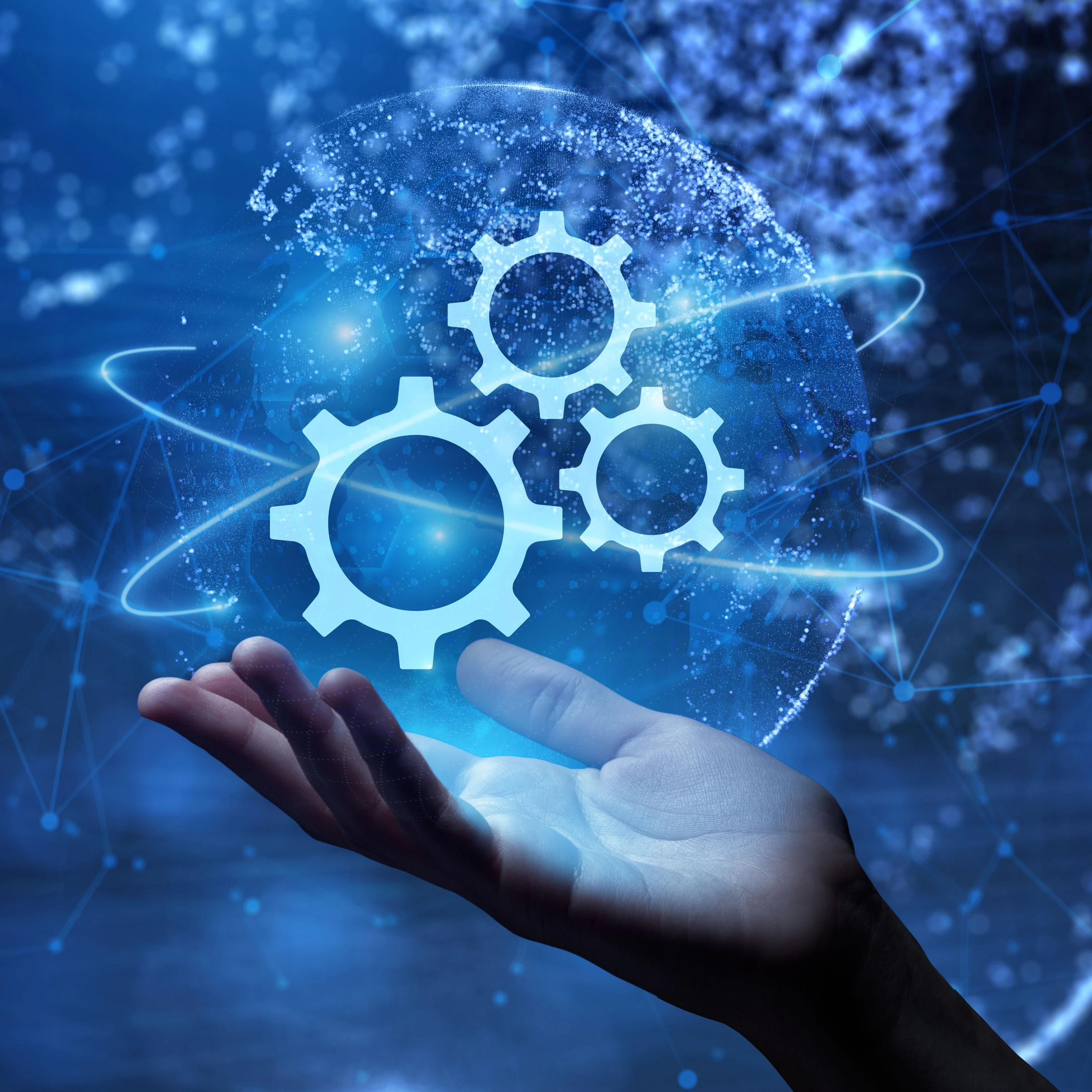 Hand holding up an animated logo of gears.