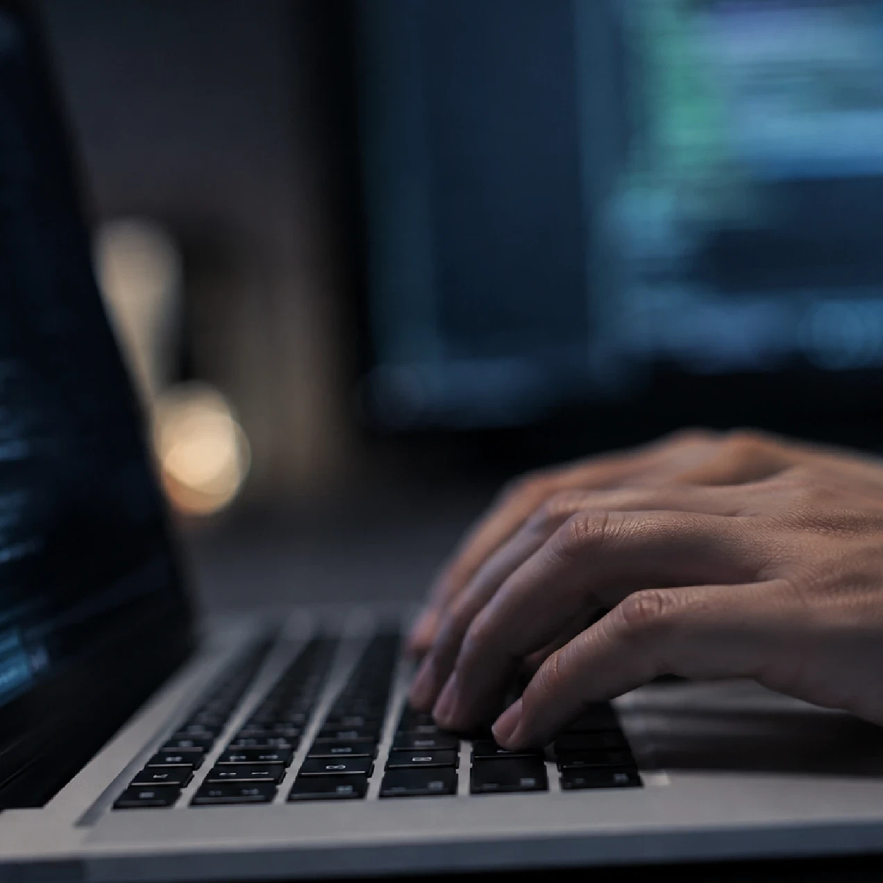 EM360Tech news graphic showing hands typing on a laptop in a dark, blue-lit setting, with code visible on screen. Text reads: “Alabama Subpoenas OpenAI Over Hugging Face AI Agent Hack.”