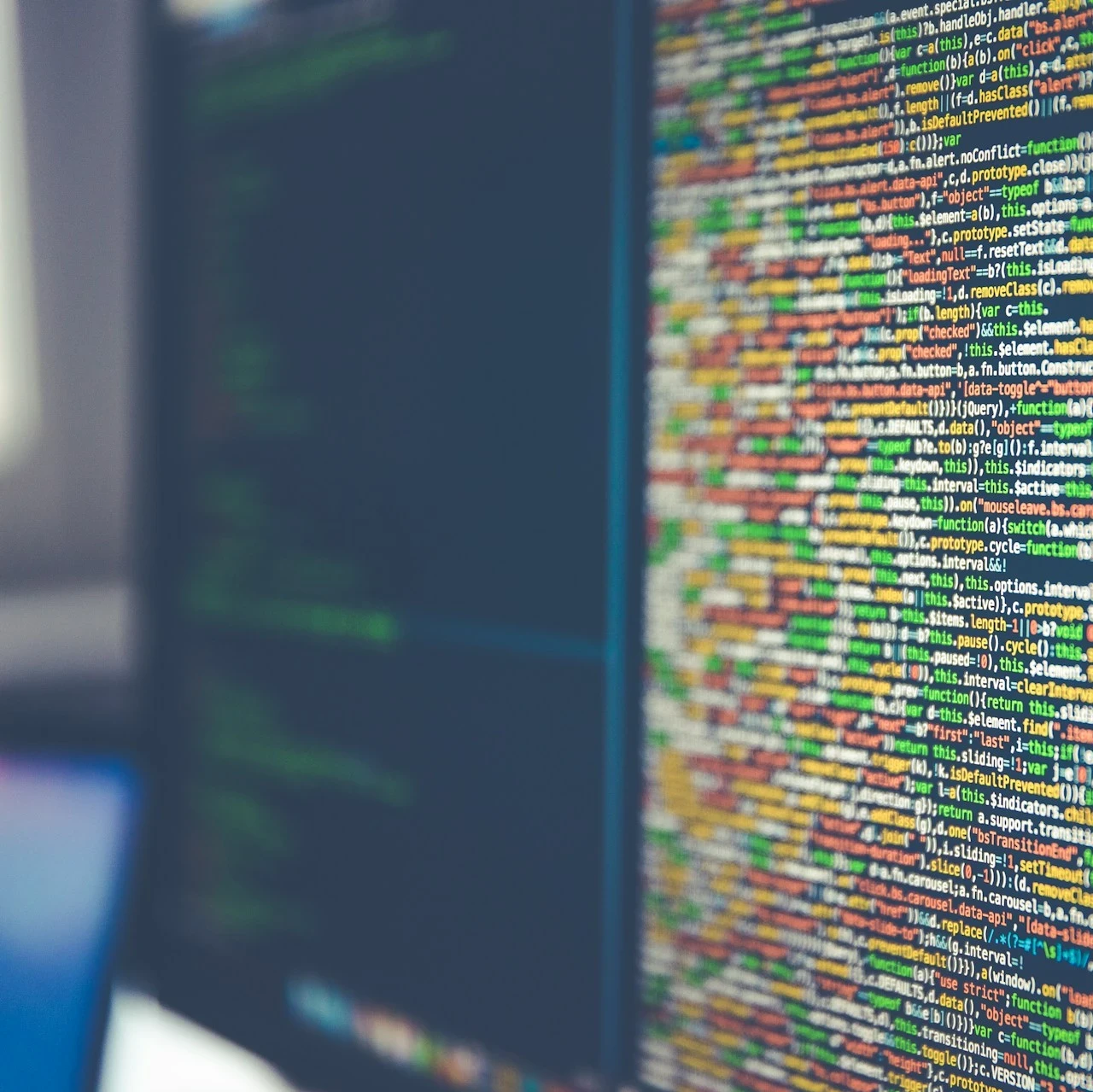 Close-up of a computer screen showcasing colourful lines of code.
