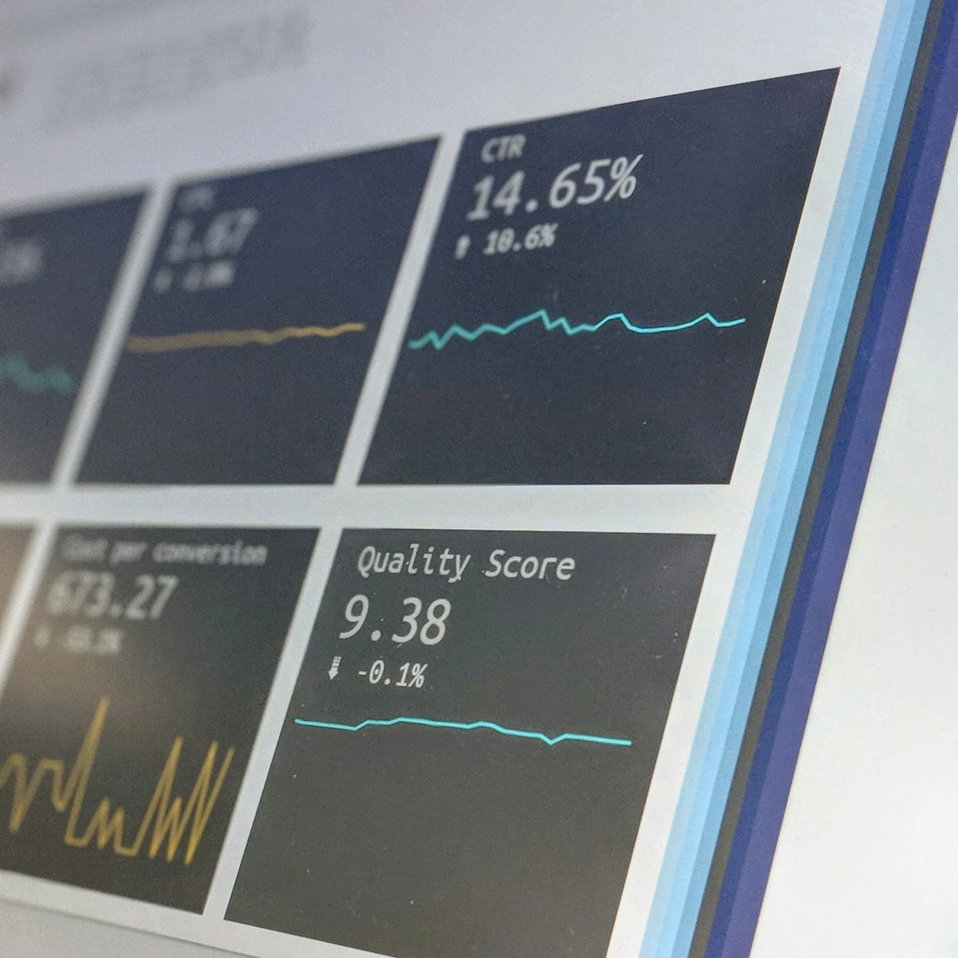 Data reporting dashboard on a laptop screen.