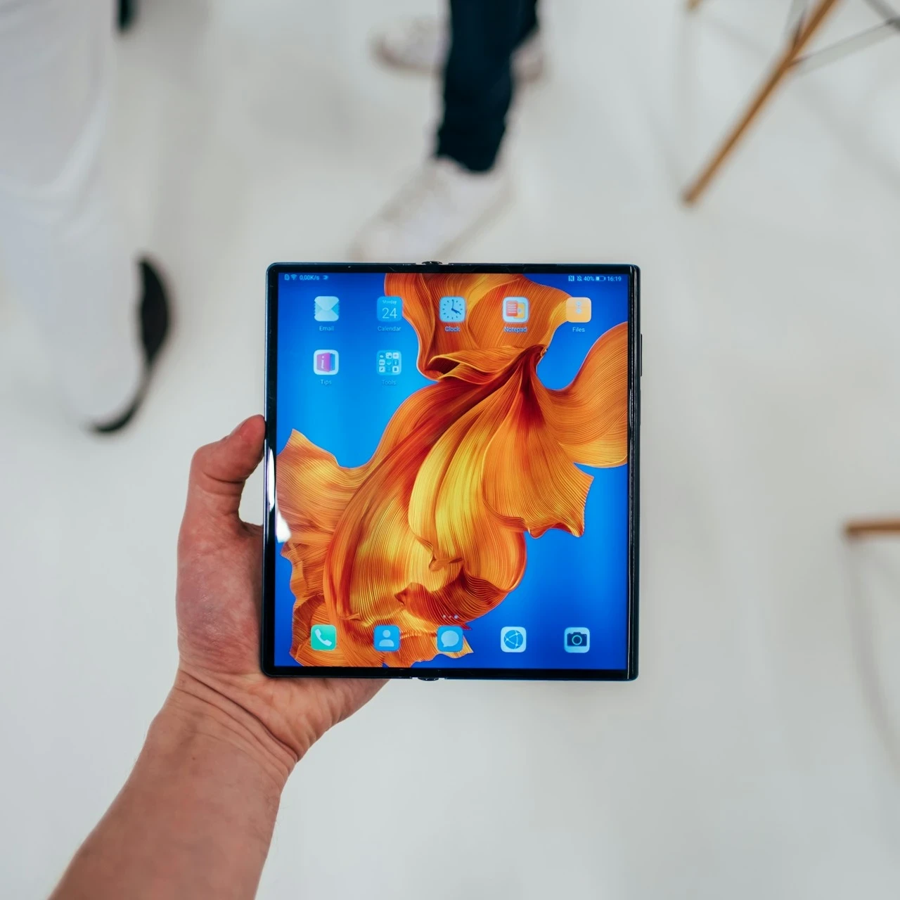 Huawei foldable smartphone Mate Xs with a colourful screen background.