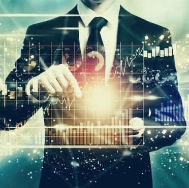 A person working on a graph showing high tech spending