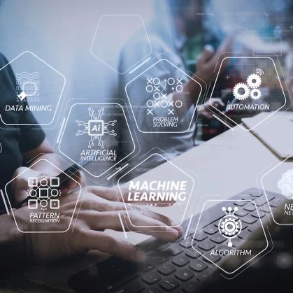 a person working on a laptop with 'machine learning' and 'algorithm' overlaid